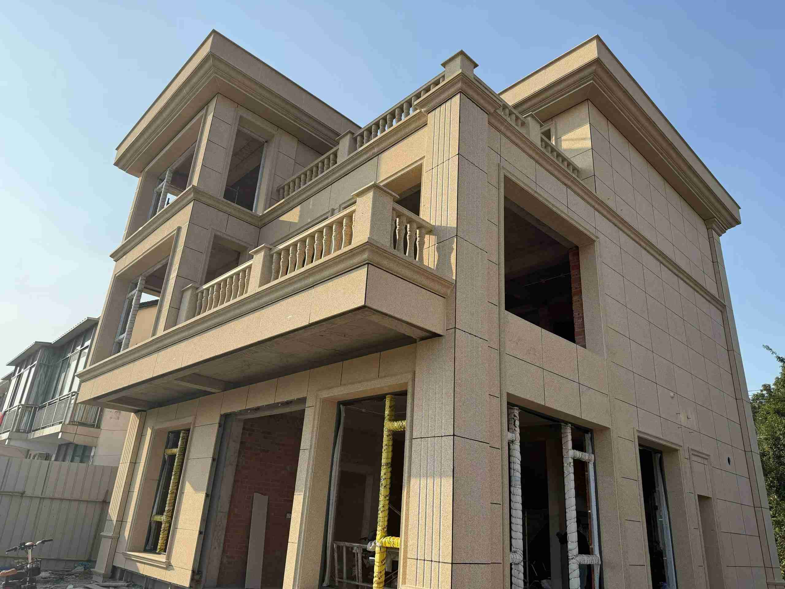 三门峡 黄金麻花岗岩石材荔枝面外墙干挂效果展示