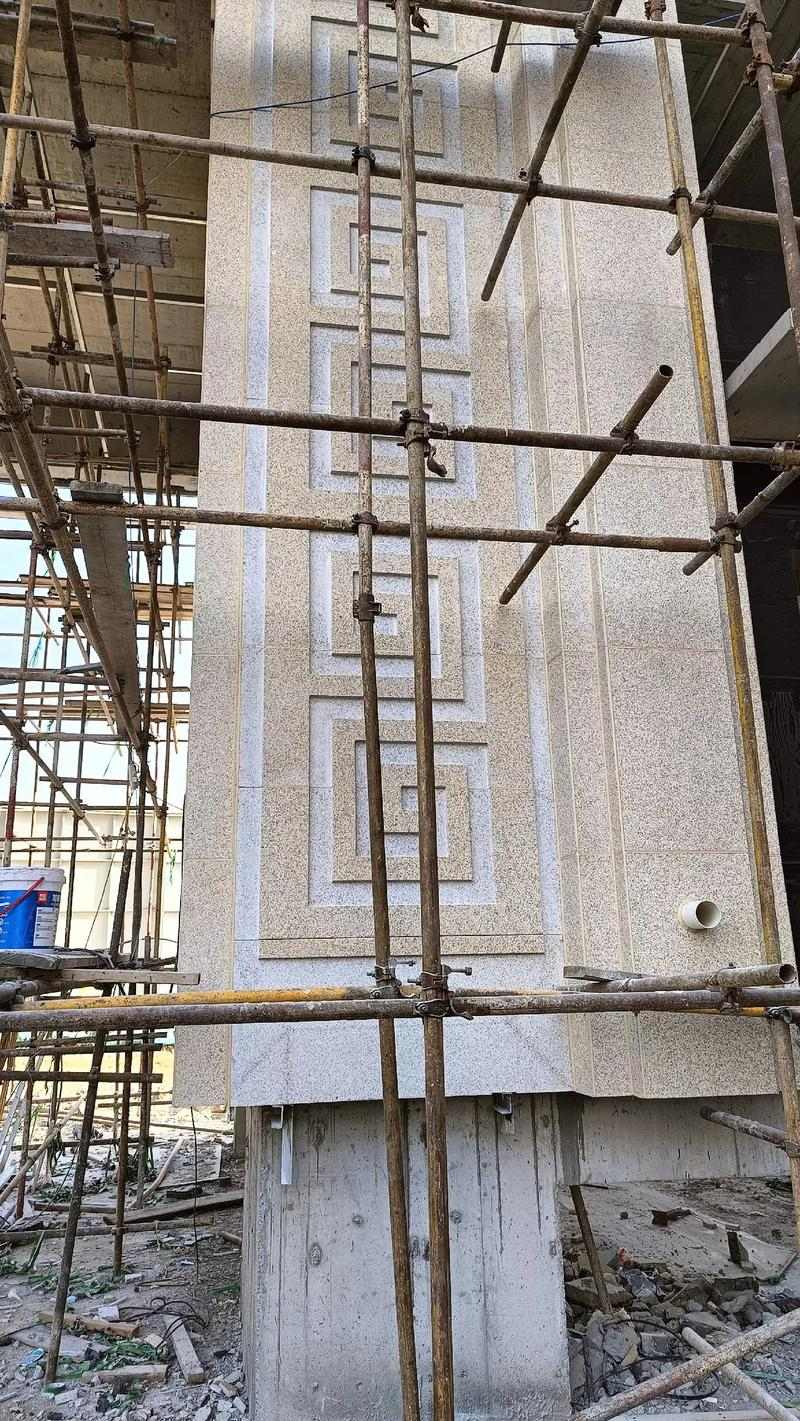 三门峡 黄金麻花岗岩别墅外墙干挂回纹造型效果